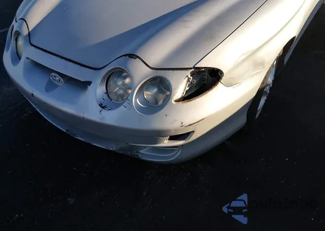 2001 Hyundai Tiburon Base Pkg 1 2 z USA, uszkodzony, nr VIN KMHJG35F11U244275